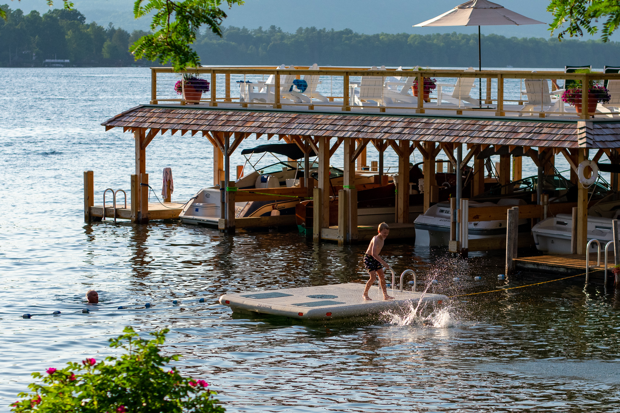 Lake George vacation cabin rentals sundecks and swim area at Takundewide Cotages