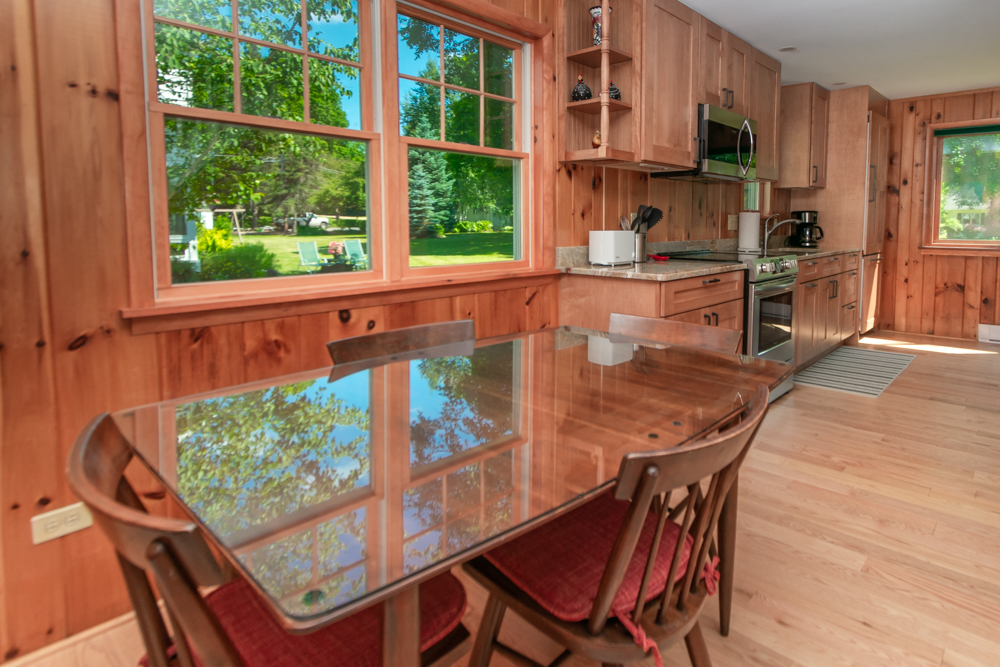 Lake George vacation cabin rental #13 kitchen and dining room at Takundewide Cottages on Lake George